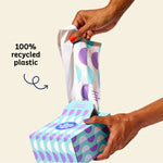 Who Gives a Crap medium 100% recycled plastic garbage bag being pulled out of the box