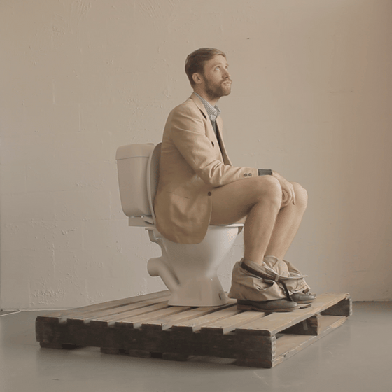 Simon Griffiths founder of Who Gives A Crap sitting on a toilet  Simon Griffiths founder of Who Gives A Crap sitting on a toilet