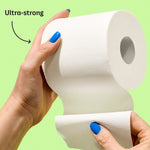 Super soft 3-ply bamboo toilet paper being held